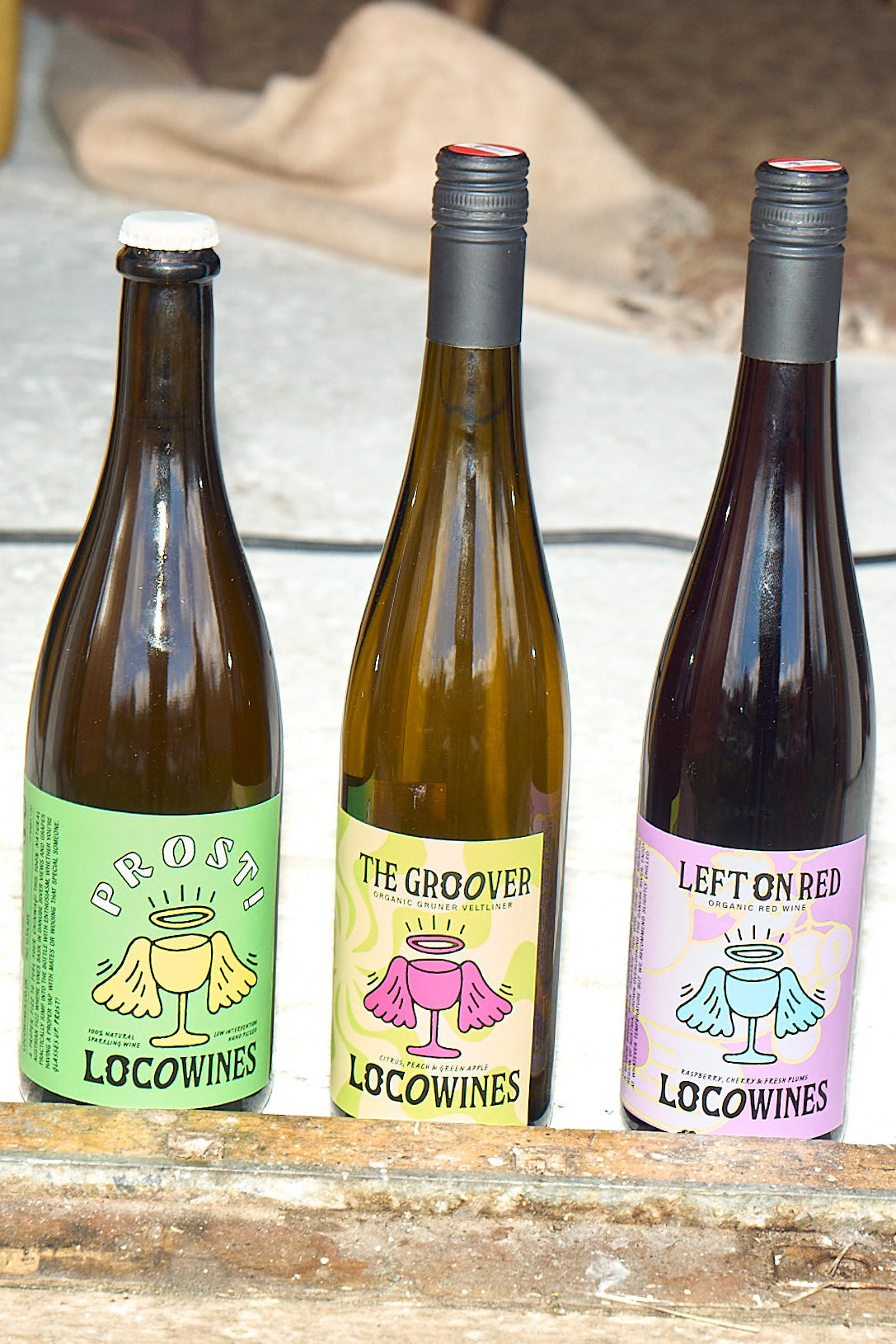 Loco Wines Keep It Simple organic wine bundle featuring PROST! sparkling, The Groover organic white wine, and Left on Red chilled organic red wine